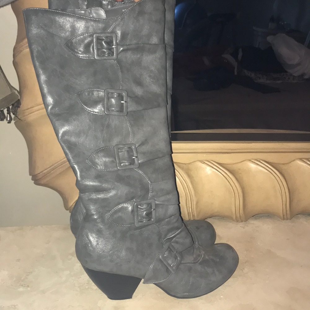 Worn cute grey boots